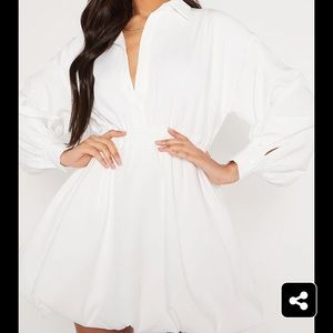 Women’s long sleeve puff dress.